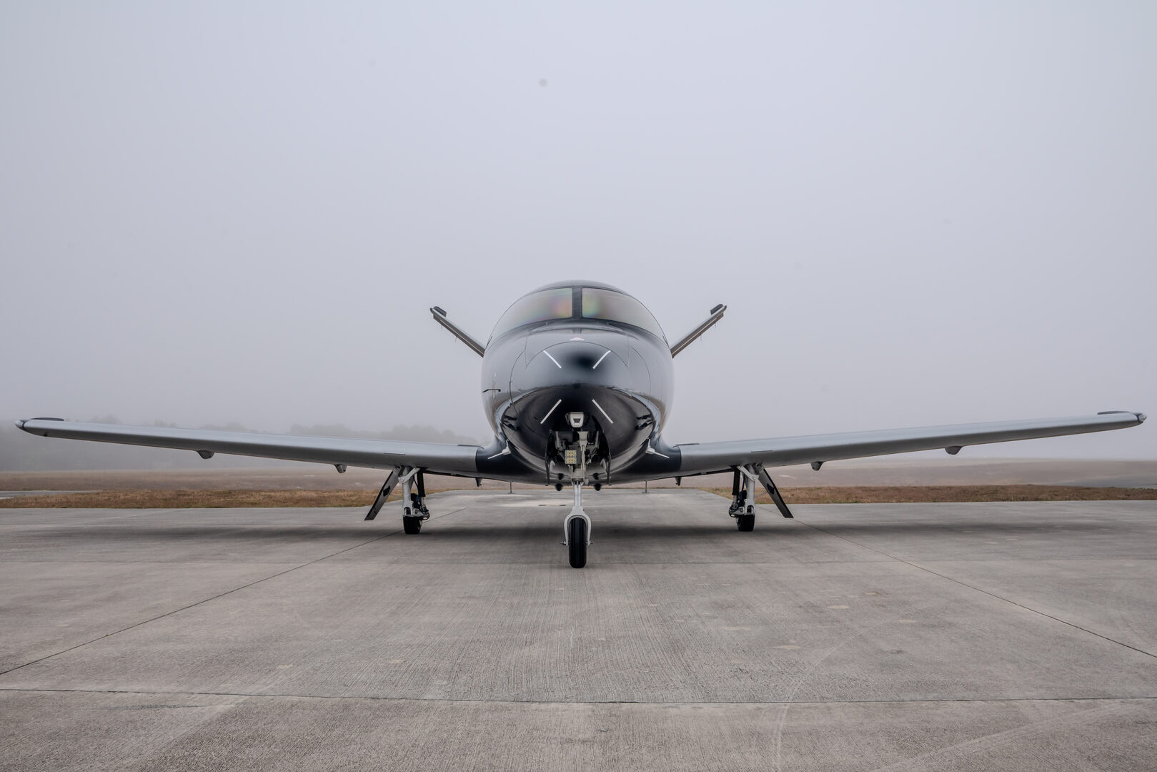 Cirrus aircraft viewed head-on at the airfield